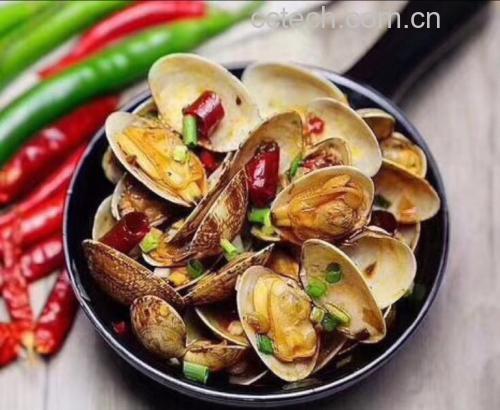 翻炒过程中的螺丝椒与扇贝